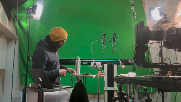 BTS shot of Dula and Edan underwater with key animator, Kecy Salangad